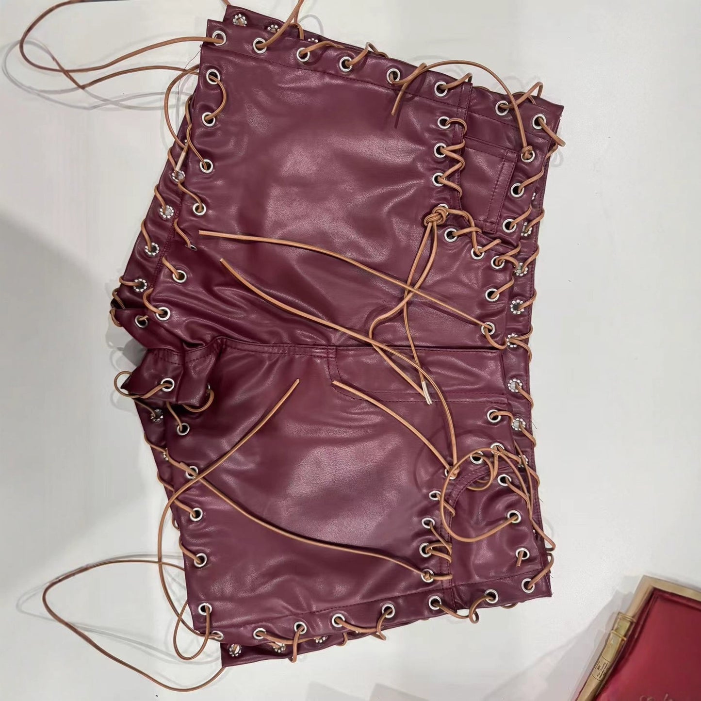 Red Rivet Strap Shorts